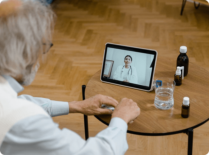 Patient using tablet for video consultation